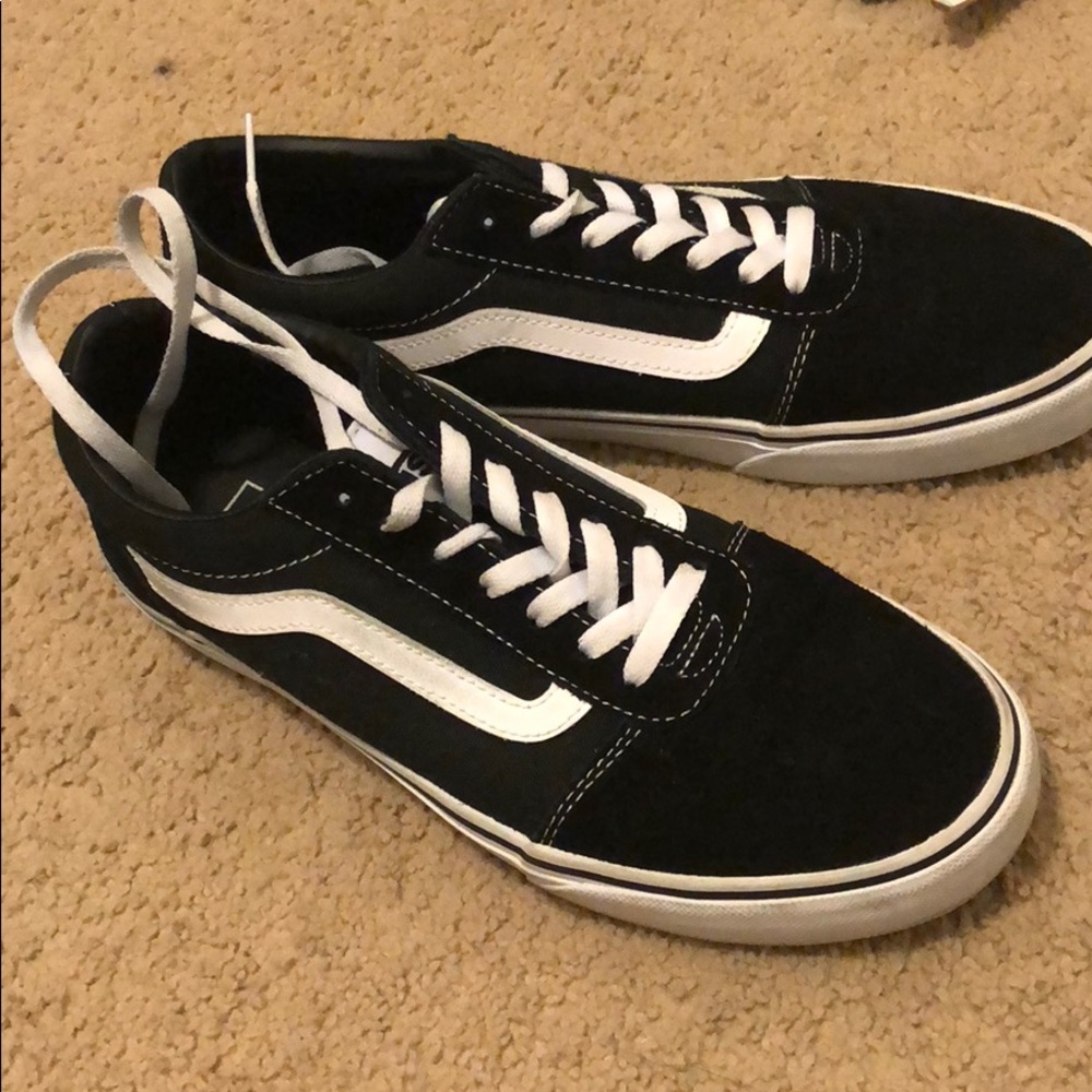 Low top black and white vans